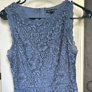 A women’s small blue semi formal dress.